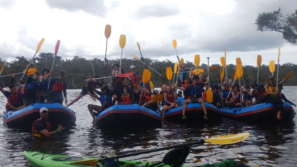 Students in boats on an expedition journey